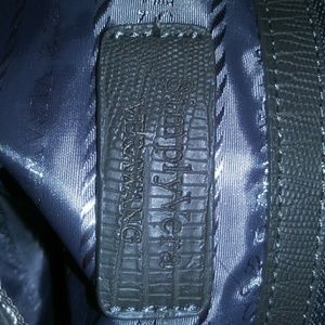 Vera Wang snake skin handbag